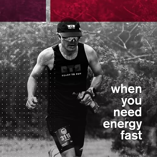 Runner in athletic gear holding energy gel with text 'when you need energy fast'.