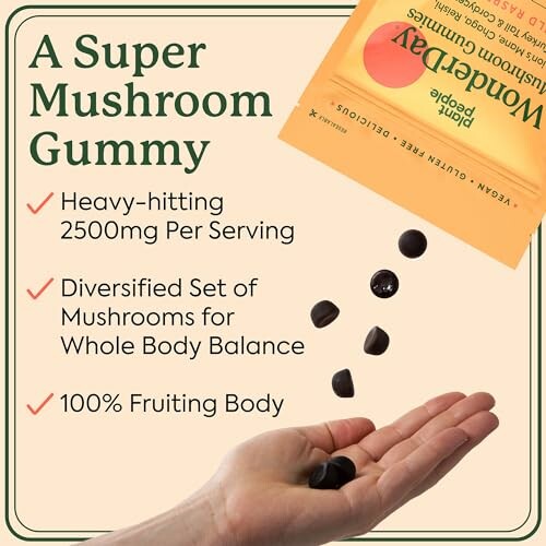 Hand holding mushroom gummies with packaging, featuring benefits like 2500mg per serving and whole body balance.