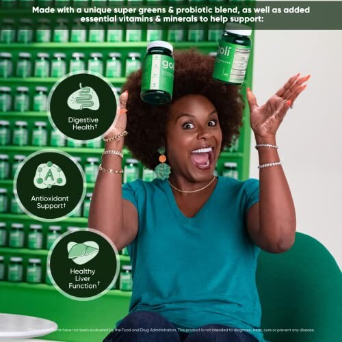 Woman excitedly holding green supplement bottles in a store.